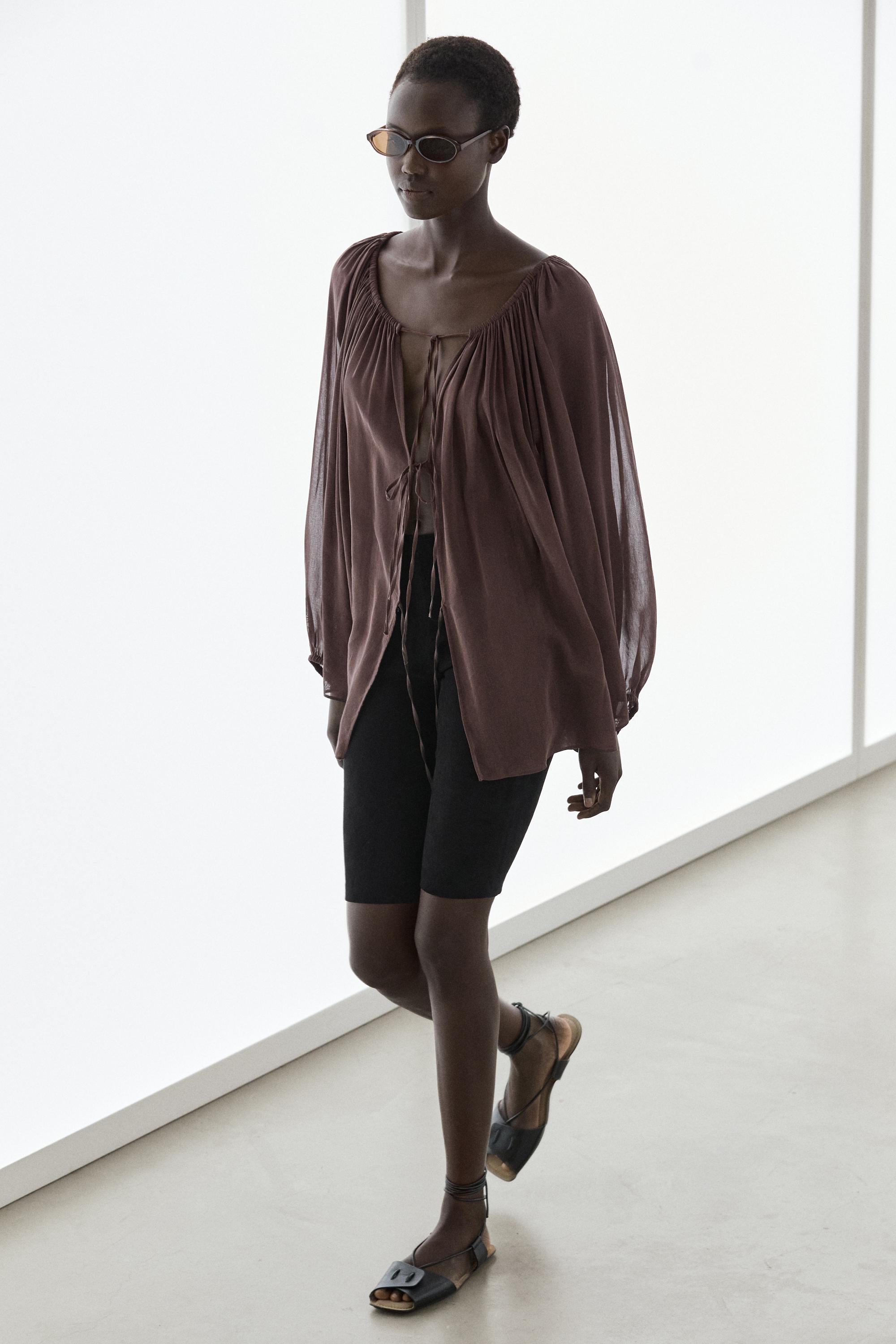 Flowing shirt with gathered details